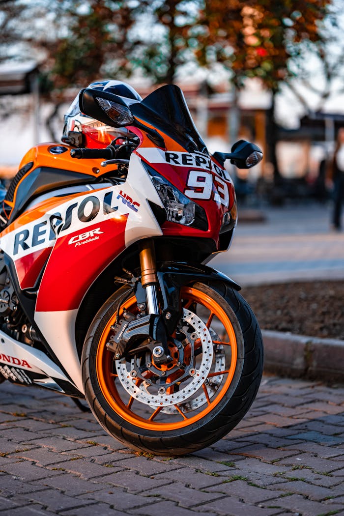 Motorcycle in vibrant colors at golden hour, representing speed and precision in a picturesque Turkish town.